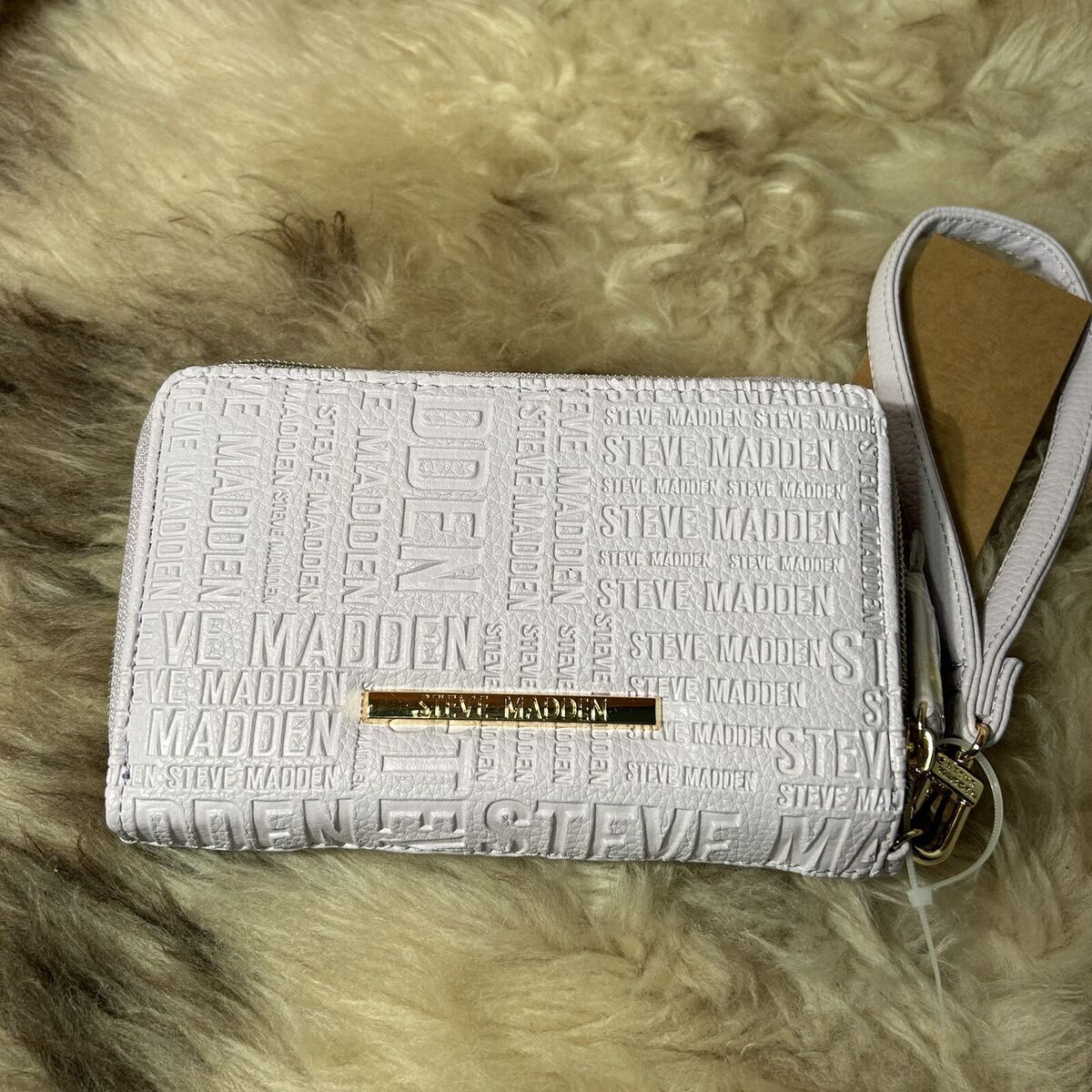 CARTERA STEVE MADDEN WRISTLET LAVANDA