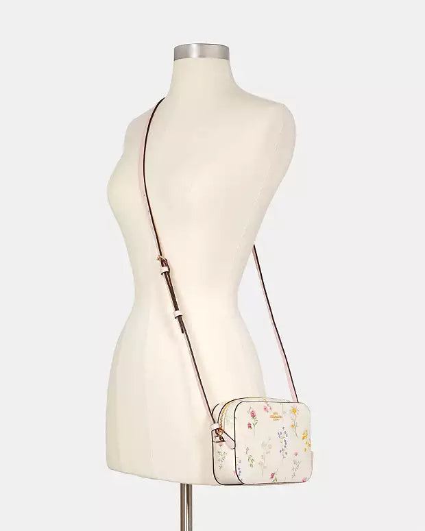 COACH mini camera bag with spaced wildflower print